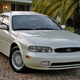 Illustration for article titled The Infiniti J30 Was A Four-Door Coupe Before It Was Fashionable